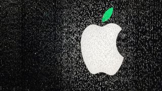 Apple Logo behind a waterfall